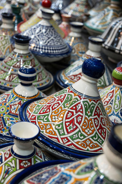 istock Colorful Moroccan Tagines Displayed on a Mosaic Tabletop 2205125001
