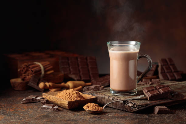 istock Creamy hot chocolate drink on a brown background. 2205125784
