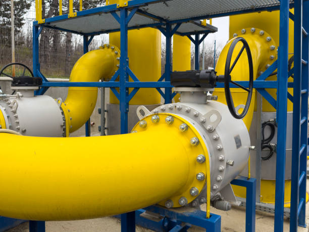 istock A collection of bright yellow pipes is securely connected to one another 2205127059