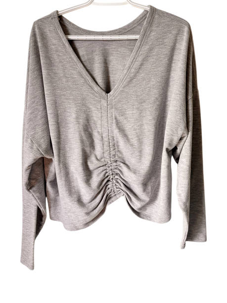 istock Gray cotton, comfy sweatshirt bunched on the front isolated 2205127446