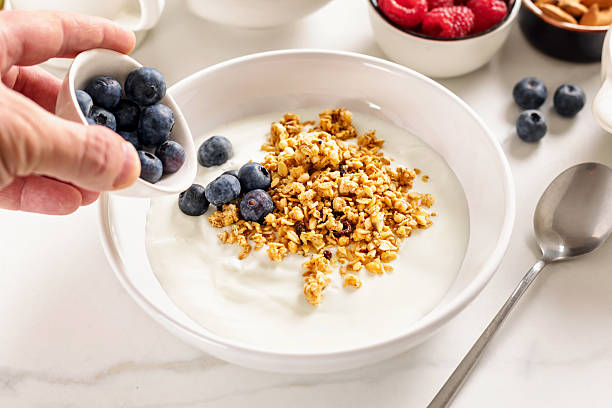 istock Healthy yogurt bowl with granola and blueberries 2205130430