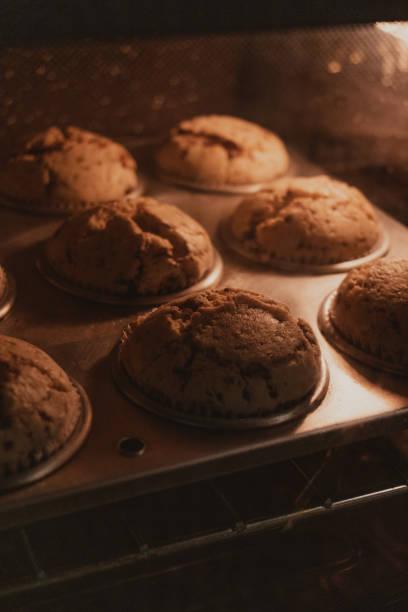 istock Muffins Baking in the Oven 2205130524