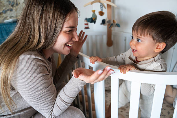 istock Happy mother and son having fun in the morning 2205133061