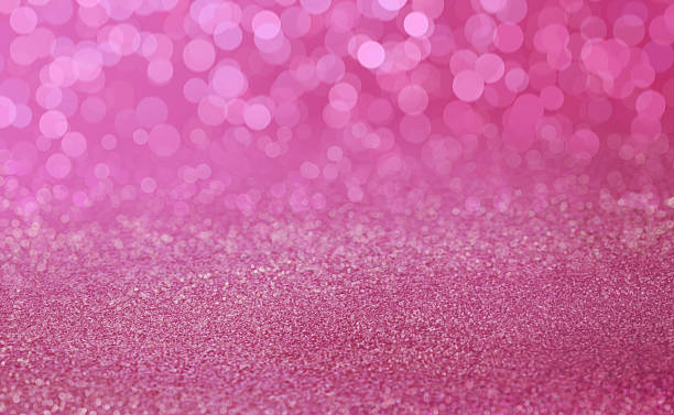 istock Pink sand texture with bokeh blur background. 2205133750
