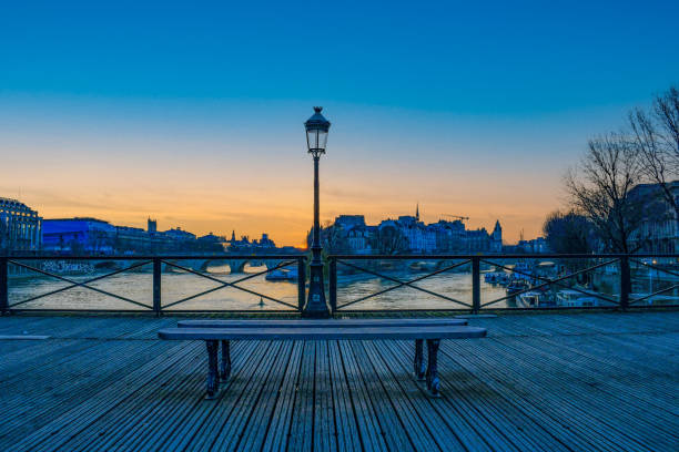 Sunrise in the Pont des Arts in Paris