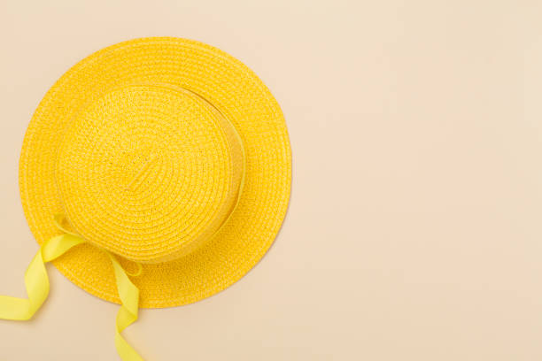 istock Yellow hat on color background, top view. Summer concept 2205141515