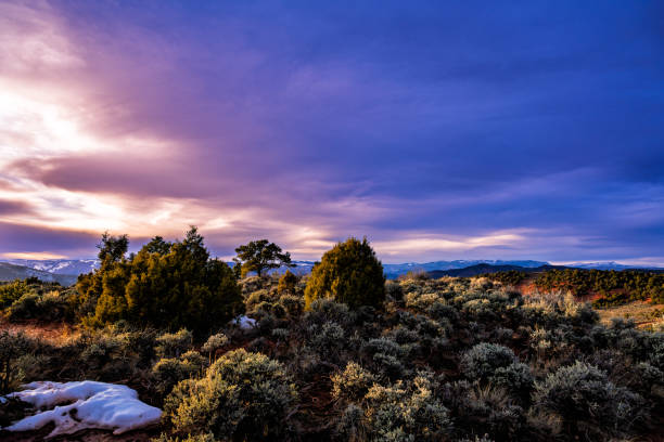 istock Moody Skies Sunset with Mountain Views 2205142181