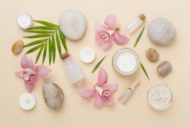 istock Composition with orchids, spa products on color background, top view 2205144687