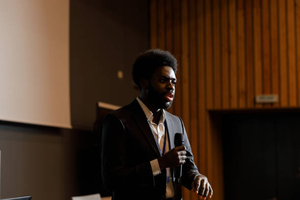 istock Professional Speaker Giving a Business Presentation 2205147563