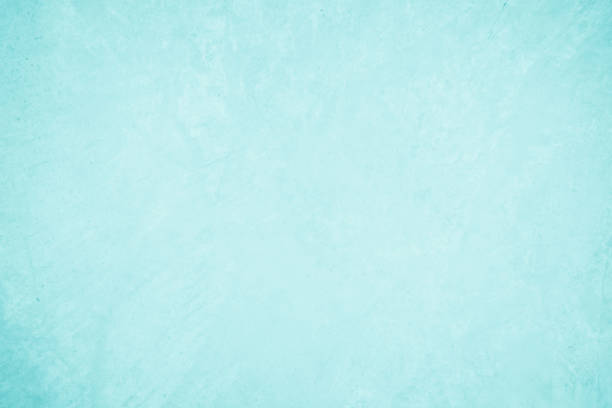 istock Pastel blue and white concrete stone texture for background in summer wallpaper. Cement and sand wall of tone vintage. Concrete abstract wall of light cyan color, cement texture mint green for design. 2205147825