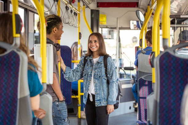 istock Multi-ethnic friends traveling together in bus 2205149916