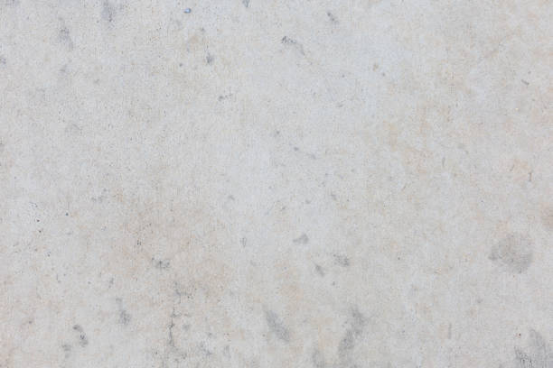 istock Grey background texture cement, industrial design wide panoramic view room. Flat White table paper grungy plaster, modern decor marble granite material, dark wall bright fortress limestone surface 2205157286