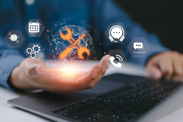 istock Maintenance concept. Repair about assistance and servicing of equipments, technical support, assistance and service. Businessman using laptop with maintenance icon on virtual screen. 2205157478