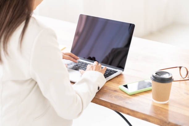 istock asian businesswoman using laptop,hands 2205162746
