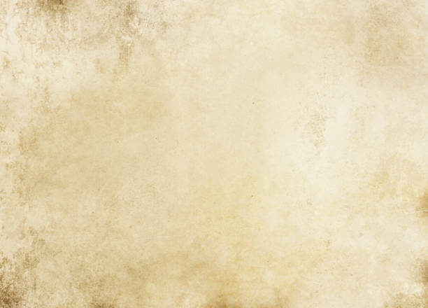 istock Old yellow stained grunge paper or parchment texture. 2205163707