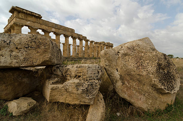 View from below of doric colomns of an old greek temple on top of a hill, Selinunte, Trapani, Sicily, Italy, Europe