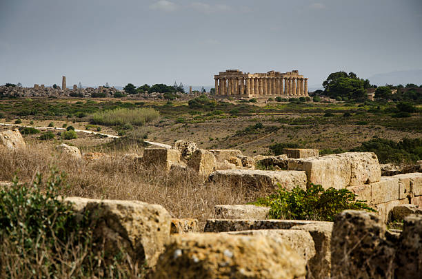 View from below of doric colomns of an old greek temple on top of a hill, Selinunte, Trapani, Sicily, Italy, Europe