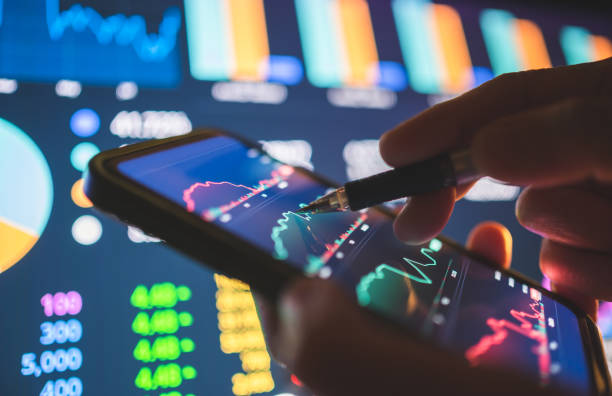 istock Millennial investor apply data of artificial intelligence working with financial consulting person using a digital tablet investment portfolio 2205181204
