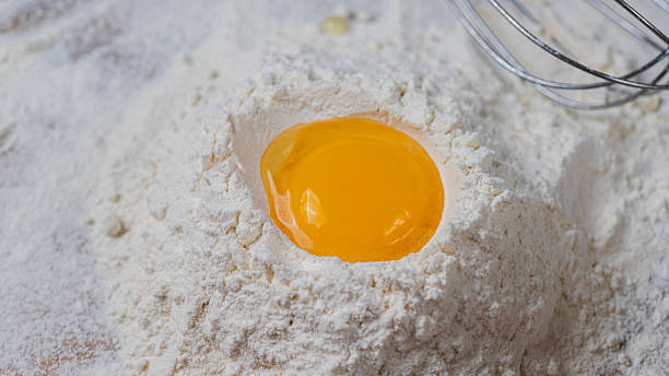 istock An egg in a flour well 2205182885