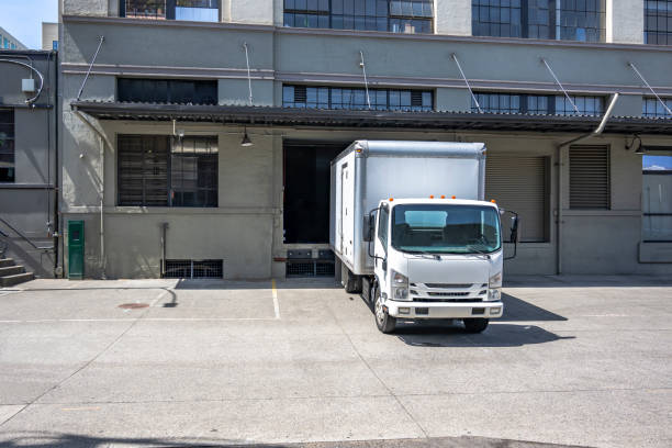 White delivery van with clipping path on gray background, Cargo van delivery truck vehicle template mockup