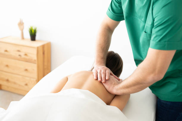 istock A young woman receiving a massage from a massage professional. 2205189452