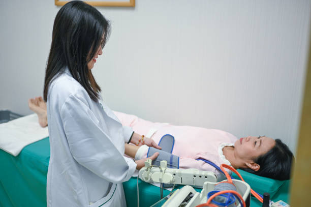 istock Compassionate Care: A Doctor Assists a Patient with a Blood Pressure Check 2205192187