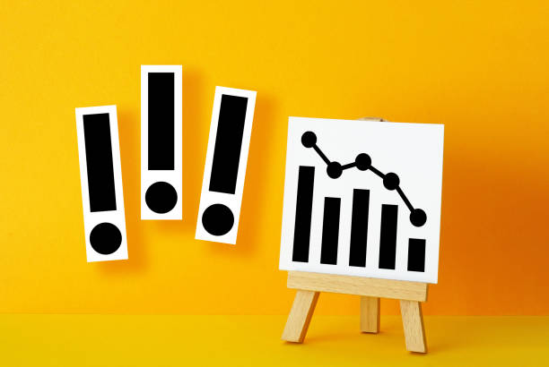 istock Banner with graph direction going down as economic downturn symbol. Financial crisis, recession and depression 2205192781
