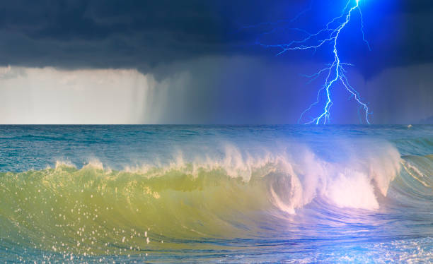 istock Beautiful landscape with lightning over the stormy sea 2205198234