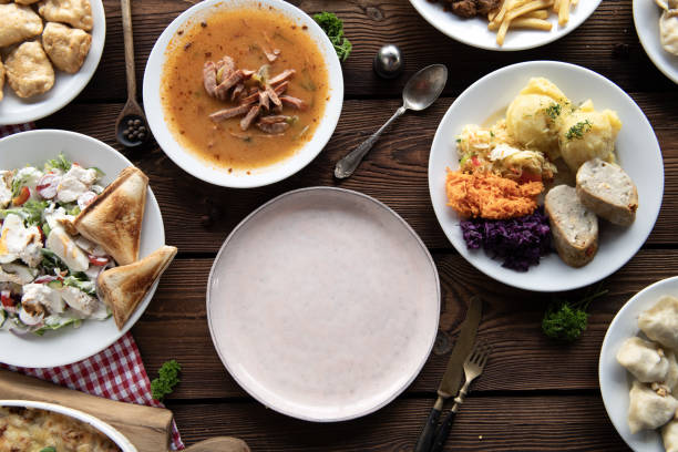 istock Rustic Feast – Traditional Home-Cooked Meal on a Wooden Table 2205203382