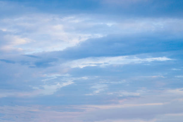 A beautiful scene of fluffy white cumulus clouds drifting across a vibrant blue sky. The soft, cotton-like formations create a peaceful and dreamy atmosphere, making this image perfect for nature-themed projects, backgrounds, travel blogs, weather forecasts, and inspirational designs. The bright blue sky adds a sense of freedom and serenity, ideal for digital and print applications