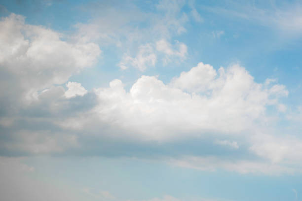 istock Fluffy White Cumulus Clouds in a Clear Blue Sky – Dreamy Natural Background 2205204384