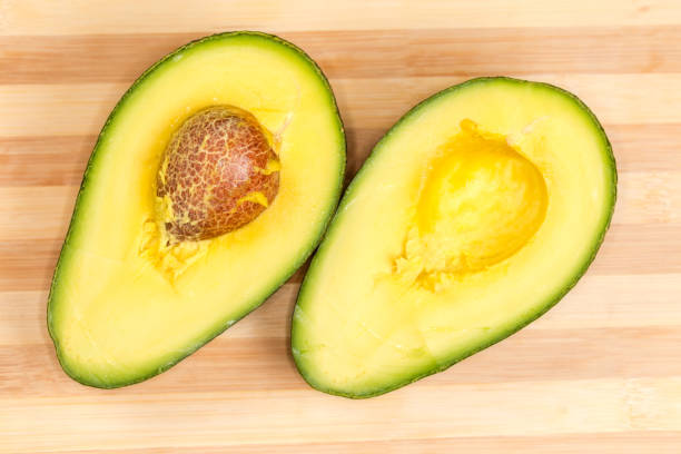 Avocado sliced isolated on white background