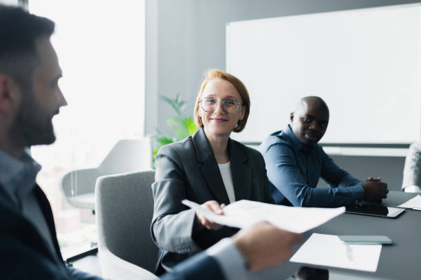 istock Business team collaborating during a professional meeting in a modern office setting 2205208850