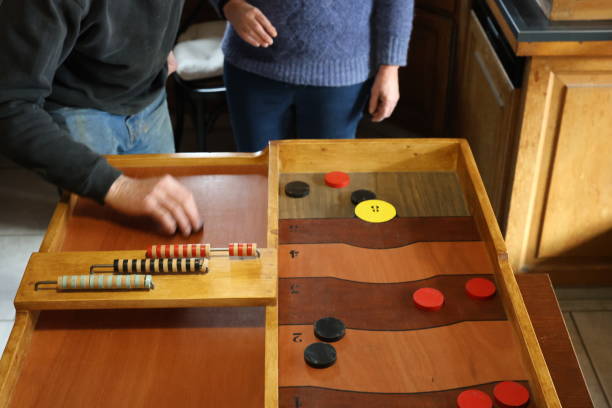 istock A senior couple playing a large wooden game 2205208884