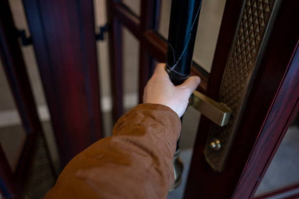 Hold the doorknob and push open the door