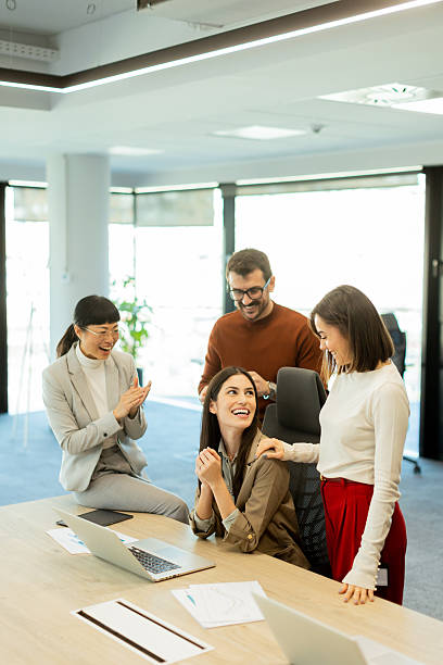 istock Team collaboration in a modern office environment during a productive brainstorming session 2205212545