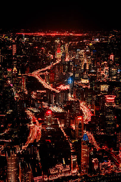 Shanghai,China 7 December 2025 vibrant city top travel destination. The Shanghai World Financial Center and Oriental Pearl Tower stand tall among skyscrapers, creating a stunning skyline in night time