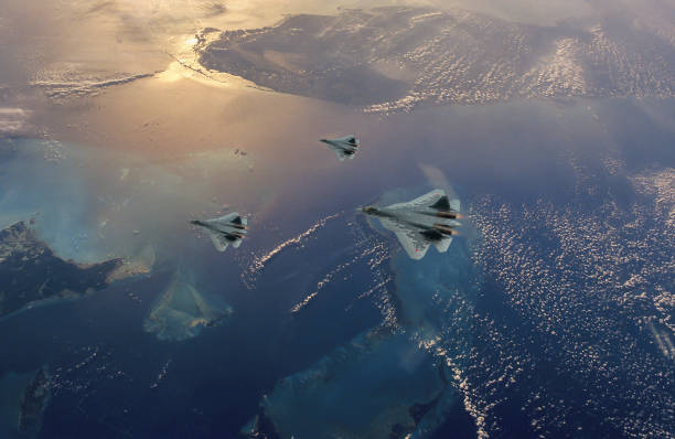 istock Air Force Fighter Jets flying over clouds. High Above The Clouds. 2205214943