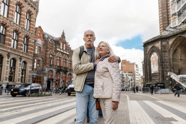 istock Senior citizens travelling in Amsterdam 2205220597