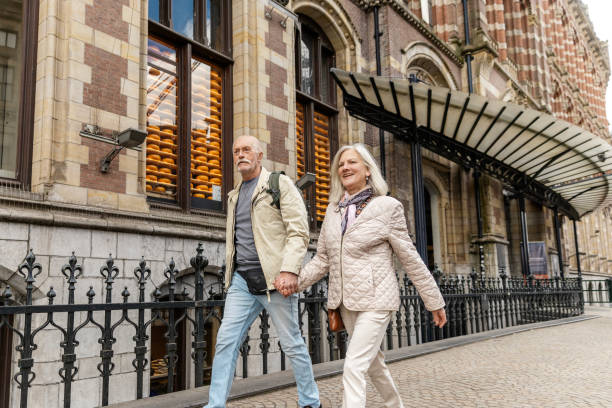 istock Senior citizens travelling in Amsterdam 2205220601
