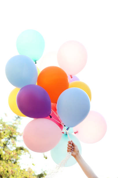 Colored balloons in the hand
