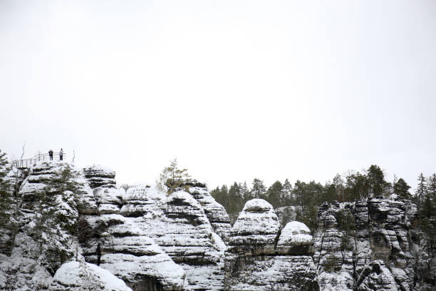 People on a view point in the Saxon Switzerland in winter time