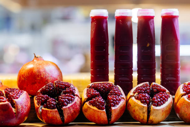 istock Fresh pomegranate juice with fruit – rich taste and natural freshness. 2205225515