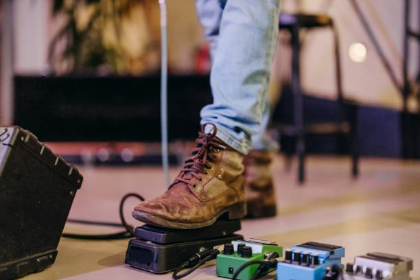 istock Foot on the padel board of a guitarist 2205227111