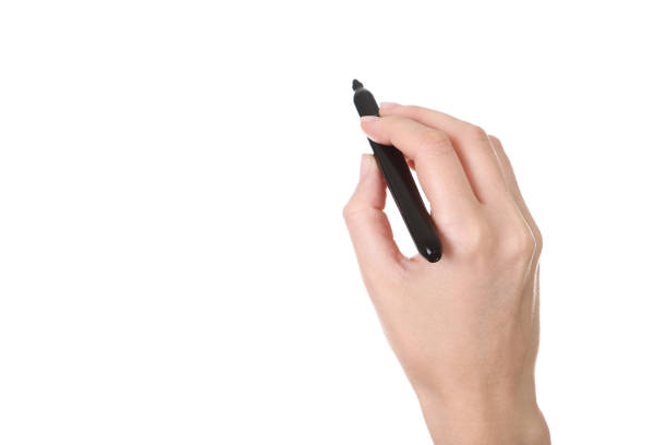 istock Female hand holding marker on white background 2205228057