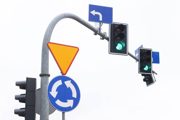 Urban street scene guiding vehicles and pedestrians.