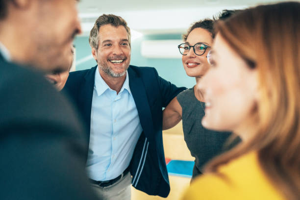 istock Cheerful team in the office 2205228651