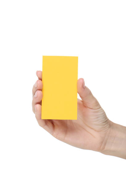 istock Female hand holding blank card on white background 2205229555