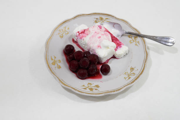 cherries with cottage cheese lie on a plate, dessert