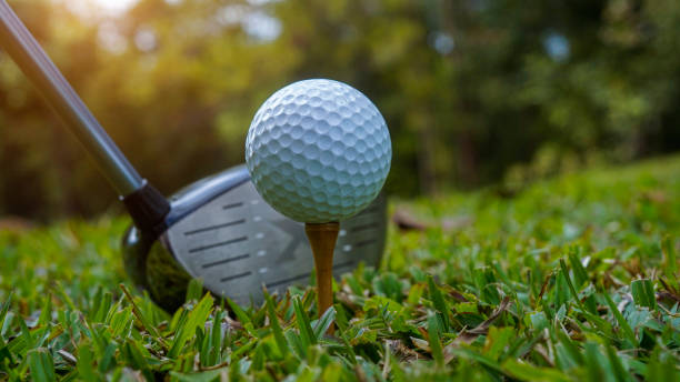 istock Close-up golf ball and golf club in beautiful golf course. 2205230749